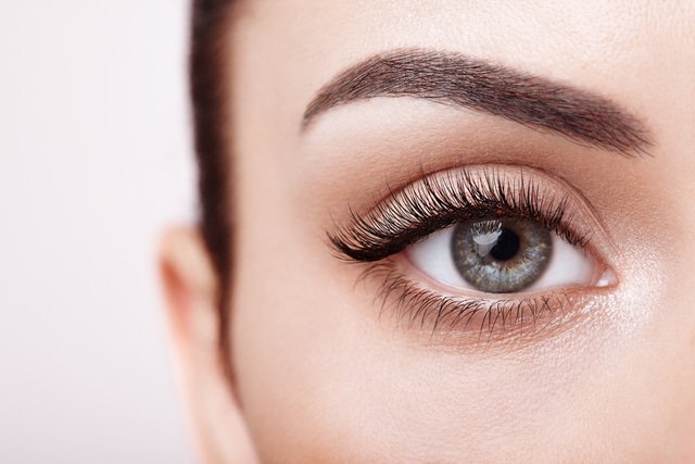 Female Eye with Extreme Long False Eyelashes