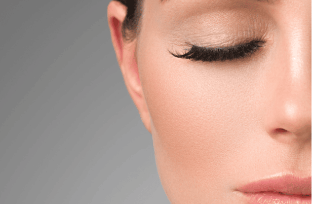 Lashes extensions eye woman macro closeup